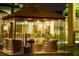 An outside gazebo area includes seating and lighting for enjoyment by residents or guests at 5245 W Irlo Bronson Memorial Hwy # 148, Kissimmee, FL 34746
