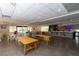 Spacious restaurant area with wood tables, sleek countertops, and televisions at 5245 W Irlo Bronson Memorial Hwy # 148, Kissimmee, FL 34746