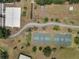 Aerial view of the community amenities including tennis and basketball courts at 5768 Los Palma Vista Dr, Orlando, FL 32837