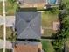 Aerial view showing the roof of a well-maintained house with manicured lawn and landscaping at 5768 Los Palma Vista Dr, Orlando, FL 32837