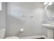 Half bath featuring a pedestal sink and a toilet at 5768 Los Palma Vista Dr, Orlando, FL 32837