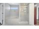 Bathroom with a tub and glass door shower at 5768 Los Palma Vista Dr, Orlando, FL 32837