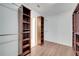 Walk-in closet showcasing custom shelves and rod storage at 5768 Los Palma Vista Dr, Orlando, FL 32837
