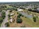 Aerial view of community park with a sand volleyball court and basketball courts at 5768 Los Palma Vista Dr, Orlando, FL 32837