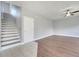 View of a staircase with white risers and wood treads leading to an upper floor at 5768 Los Palma Vista Dr, Orlando, FL 32837