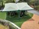 Community playground features an activity center and padded ground cover at 5768 Los Palma Vista Dr, Orlando, FL 32837
