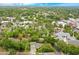 Lovely aerial view of a quiet neighborhood with mature trees and well-maintained homes at 606 N Mcdonald St, Mount Dora, FL 32757