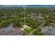 Desirable property location displayed in aerial view with surrounding mature trees and homes at 606 N Mcdonald St, Mount Dora, FL 32757
