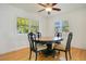 Dining room with natural light and hardwood floors at 606 N Mcdonald St, Mount Dora, FL 32757