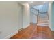 Entryway features tile flooring, staircase, and access to multiple rooms and hallways at 606 N Mcdonald St, Mount Dora, FL 32757