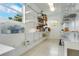 Spacious storage room with built-in shelving, perfect for keeping your home organized and clutter-free at 606 N Mcdonald St, Mount Dora, FL 32757