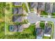 Birds-eye view of homes and cul-de-sac, showcasing landscaping and pool area at 6080 Fender Ct, Orlando, FL 32837