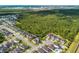 Neighborhood aerial view highlighting the property's location near lush green space and amenities at 6080 Fender Ct, Orlando, FL 32837