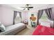 bedroom with 2 beds and desk at 6080 Fender Ct, Orlando, FL 32837