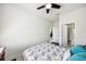 Bedroom with door to bathroom and view of another room at 6080 Fender Ct, Orlando, FL 32837