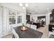 Dining room features an adjacent view of the kitchen and living room at 6080 Fender Ct, Orlando, FL 32837