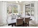 Dining room boasts natural light with great views of the outdoor patio at 6080 Fender Ct, Orlando, FL 32837
