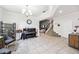 Open-concept living room with tile floors, piano, and an elegant chandelier at 6080 Fender Ct, Orlando, FL 32837