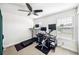 Office space features multiple monitors and a treadmill at 6080 Fender Ct, Orlando, FL 32837