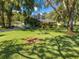 Well maintained home with beautiful landscaping and mature trees at 6464 Timberwind Pl, Orlando, FL 32818