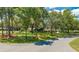 Charming home nestled amongst beautiful tree lined neighborhood with mature landscaping at 6464 Timberwind Pl, Orlando, FL 32818