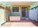 Covered brick patio for outdoor enjoyment at 6464 Timberwind Pl, Orlando, FL 32818