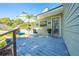 Charming outdoor patio with seating area, perfect for enjoying the serene surroundings at 6464 Timberwind Pl, Orlando, FL 32818