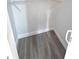 Walk-in closet with wood-look floors and a wire shelf at 709 28Th Nw St, Winter Haven, FL 33881