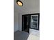 Interior view from front door showing black trimmed windows and newly renovated interior at 709 28Th Nw St, Winter Haven, FL 33881