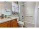 Bathroom featuring a shower-tub combination and light wood vanity with marble countertop at 8571 La Isla Dr, Kissimmee, FL 34747