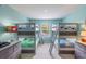 bedroom featuring bunk beds, neutral walls, and a window at 8571 La Isla Dr, Kissimmee, FL 34747