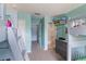 bedroom featuring bunk beds, TV, and access to a bathroom at 8571 La Isla Dr, Kissimmee, FL 34747