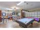 Large game room featuring pool table, air hockey, ping pong and foosball at 8571 La Isla Dr, Kissimmee, FL 34747