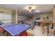 Fun game room with ping pong, foosball table, and pool table at 8571 La Isla Dr, Kissimmee, FL 34747