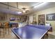 Entertaining game room with ping pong, foosball, and pool tables at 8571 La Isla Dr, Kissimmee, FL 34747