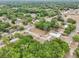 Aerial view of the neighborhood showing lush trees and quiet streets at 918 Louise Ln, Deland, FL 32720