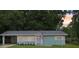 Charming single-story home with a well-maintained lawn and an American flag waving at 918 Louise Ln, Deland, FL 32720