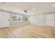 Spacious living room showcasing hardwood floors, neutral paint, and lots of natural light at 918 Louise Ln, Deland, FL 32720