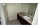 Bathroom features a sink and vanity at 979 Hacienda Cir, Kissimmee, FL 34741
