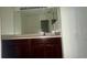 Bathroom features a sink and vanity at 979 Hacienda Cir, Kissimmee, FL 34741