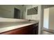 Bathroom features a sink and vanity at 979 Hacienda Cir, Kissimmee, FL 34741