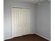 Bedroom closet offers concealed storage space and plush carpeting at 979 Hacienda Cir, Kissimmee, FL 34741