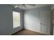 Bedroom featuring natural light and a convenient closet, offering a comfortable space at 979 Hacienda Cir, Kissimmee, FL 34741
