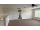 Upstairs bedroom with natural light from a large window at 979 Hacienda Cir, Kissimmee, FL 34741