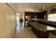 Modern kitchen with granite counters, stainless steel appliances, and a spacious island at 979 Hacienda Cir, Kissimmee, FL 34741