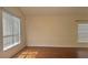 Bright living room with hardwood flooring, crown molding, and lots of natural light at 979 Hacienda Cir, Kissimmee, FL 34741