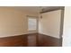 Dining room with hardwood flooring, crown molding, and modern lighting fixture at 979 Hacienda Cir, Kissimmee, FL 34741