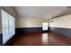 Spacious living room with hardwood floors and neutral color palette at 979 Hacienda Cir, Kissimmee, FL 34741