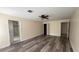Spacious main bedroom features hard wood flooring and ample natural light at 979 Hacienda Cir, Kissimmee, FL 34741