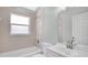 Bathroom with a tub and shower combo, vanity and plenty of storage space at 101 Majestic Forest Run, Sanford, FL 32771